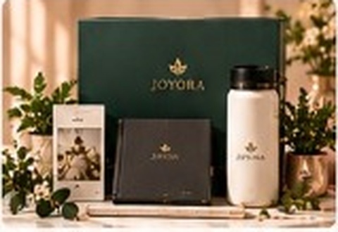 Employee Welcome Kits with branded notebook, thermos, and desk accessories in luxury gift box